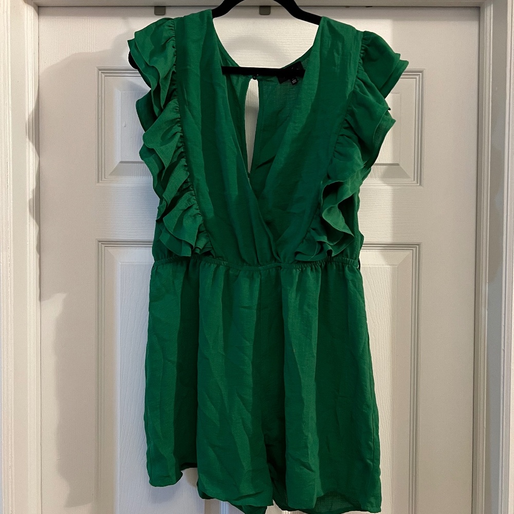 Green romper with ruffles